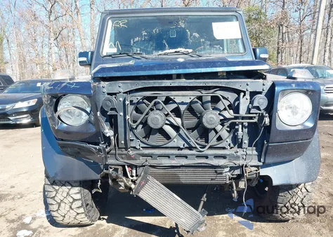 2003 Mercedes-Benz G 500 z USA, uszkodzony, nr VIN WDCYR49E23X142385